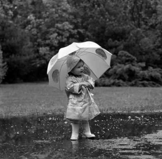Charming poster of a small girl walking in the rain with an umbrella