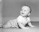 Adorable baby boy crawling and smiling poster print.