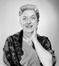 Surprised woman smiling at the camera poster print