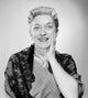 Surprised woman smiling at the camera poster print