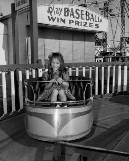 Girl on carousel poster print front view, colorful and whimsical art.