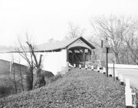Covered Bridge over the Delaware River poster print showcasing serene landscape connecting Pennsylvania and New Jersey.