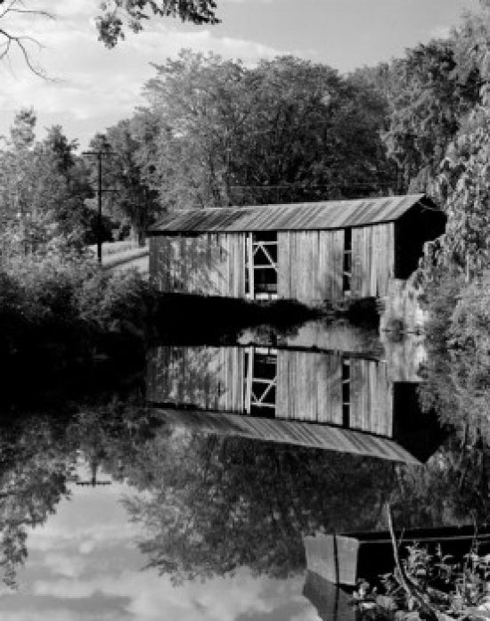 Vermont covered bridge reflecting in a lake poster print