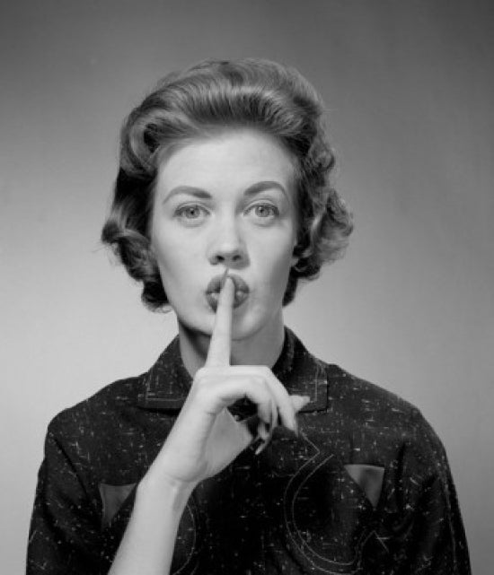 Woman with Finger on Lips Poster Print, captivating art piece for home decor.