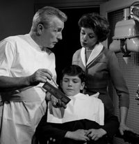 Mother with Son in Dentist Office Poster Print