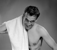 Portrait of man drying himself with towel poster print