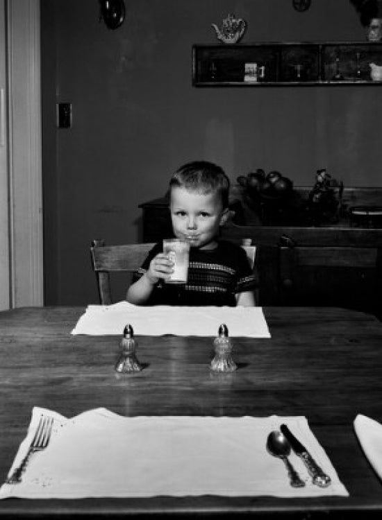 Charming boy drinking milk poster print 18x24