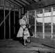 Family Contemplating Future Home Poster Print