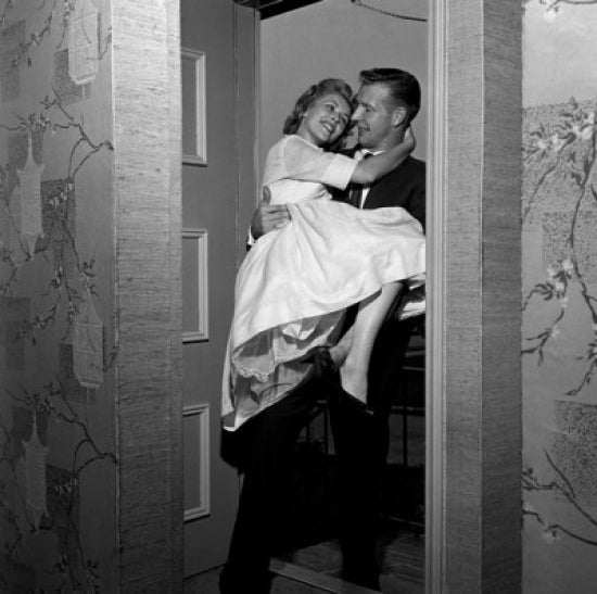 Young couple moving into new home poster print