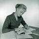 Female Student Writing Poster Print - Inspiring Art for Study Spaces