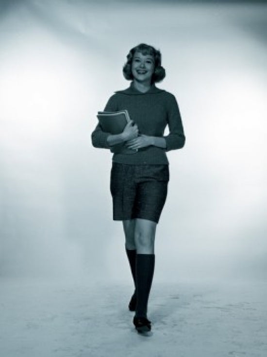 Studio portrait of a smiling female student poster print