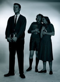 Studio shot of female students gossiping poster print