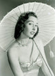 Portrait of young woman with umbrella poster print