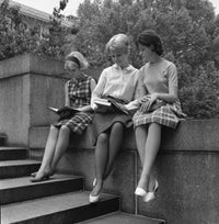 Tree Young Students Sitting on Wall and Reading Books Poster Print