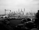 New York City skyline poster print featuring cars in a parking lot with Manhattan skyline in the background.