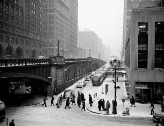 New York City winter street scene poster print showing a snowy street.