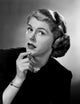 Studio portrait of mid adult woman poster print showcasing elegance.