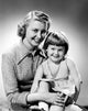 Studio portrait of mother with daughter poster print