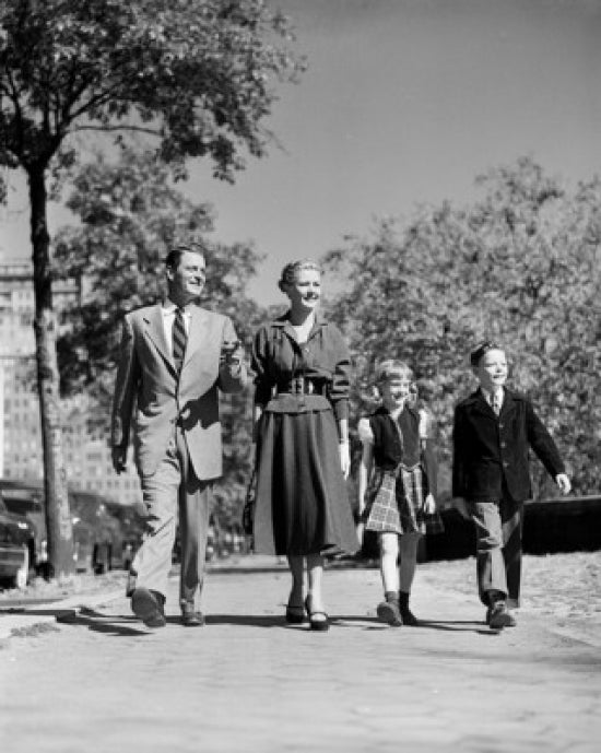 Parents with kids walking through park poster print, family bonding artwork.