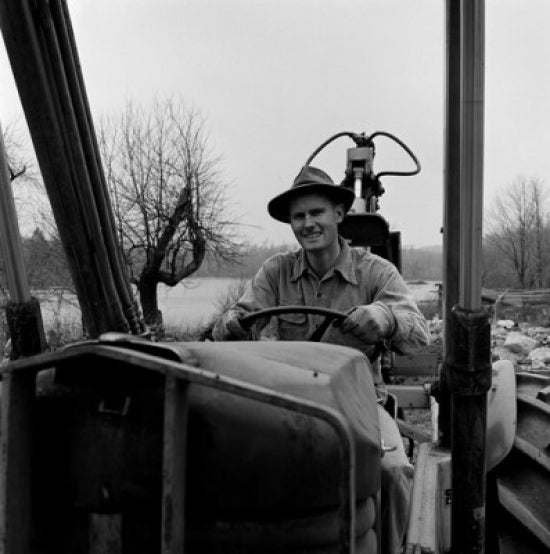 Man Driving Tractor Poster Print showcasing rural life and agriculture.