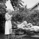 Senior couple relaxing in backyard poster print.