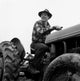 Man Driving Tractor Poster Print, vibrant rural artwork