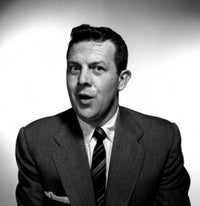 Studio portrait of a mid adult man poster print showcasing confidence and style.
