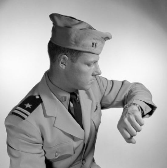 Male Navy Soldier Checking Time on Wristwatch Poster Print