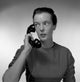 Young Woman Using Telephone Poster Print showcasing vintage communication.