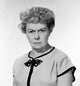 Portrait of a displeased mature woman frowning in a studio shot poster print.