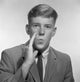 Teenage Boy Whispering Poster Print in studio shot