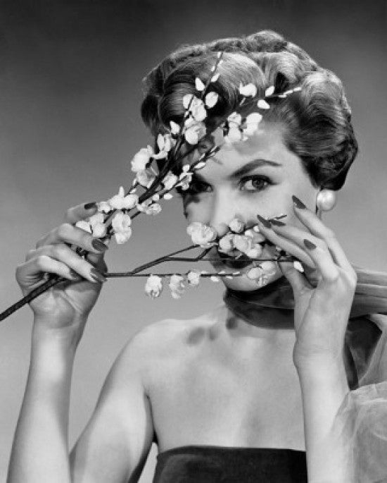 Portrait of a Young Woman Peeking Through Flowers Fine Art Print