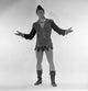 Smiling man in elf costume studio shot poster print