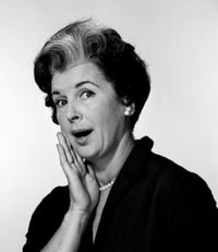 Mature woman with surprised expression poster print.