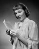 Close-up of a young woman reading a letter, emotional artwork poster print.