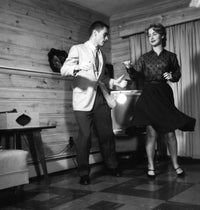 Dancing Couple Poster Print capturing movement and connection.