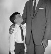 Father Embracing Son Poster Print - Heartwarming family artwork.