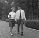 Students couple walking in park poster print