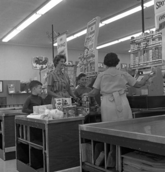 Family Shopping in Supermarket Poster Print showcasing a joyful family scene.