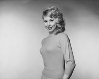 Portrait of a young woman smiling poster print
