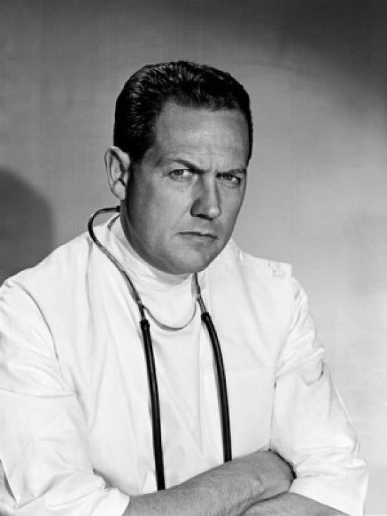 Portrait of Mature Male Doctor Poster Print, ideal for medical offices and home decor.