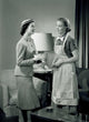 Elegant Woman Talking to Maid Poster Print showcasing human interaction.
