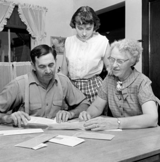 Family with teenage daughter planning home finance poster print