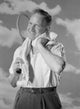 Portrait of male tennis player drying neck with towel poster print.