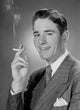 Portrait of mid adult man smoking a cigarette poster print.