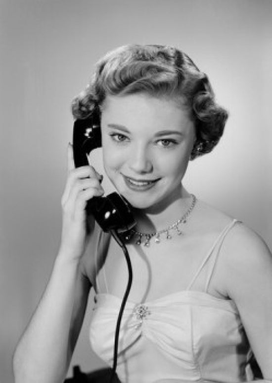 Portrait of a young woman talking on the phone, poster print.