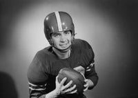 Portrait of Young Football Player Poster Print showcasing a young athlete in action.