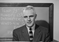 Weather Presenter Poster Print featuring a presenter in front of a blackboard.