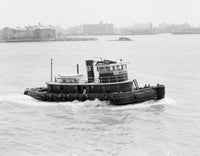 Tugboat on the East River Poster Print showcasing New York City