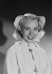 Portrait of a smiling woman in a hat - studio shot poster print.